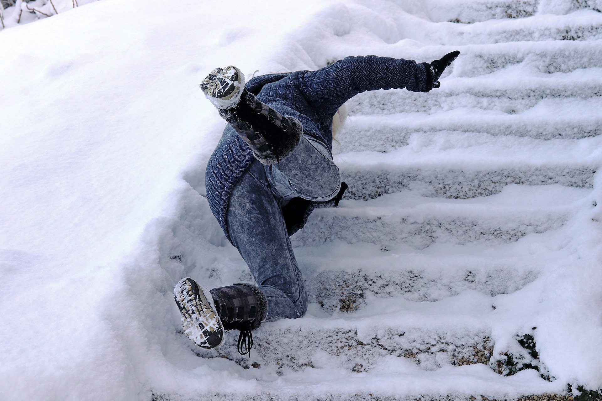 Person Falling On Icy Stairs